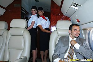 Ariella Ferrera & Aimee Addison in CFNM Secret: First-class service from two sexed-up flight attendants in tight skirts