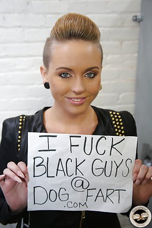 Miley May in gloryhole.com: Blond-haired beauty with shaved sides enjoying black cocks via a glory hole