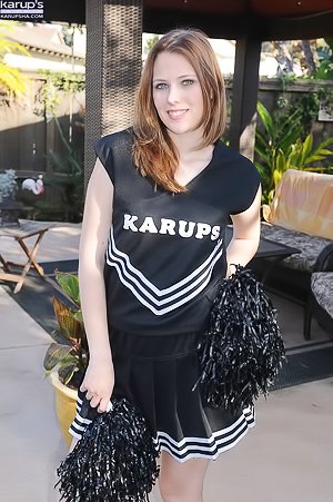 Redhead with see-through pink panties gets completely naked outdoors