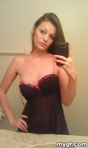 Dark-haired teen snapping sexy selfies and riding a massive cock